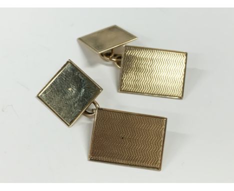 A pair of square engine turned cuff-links.