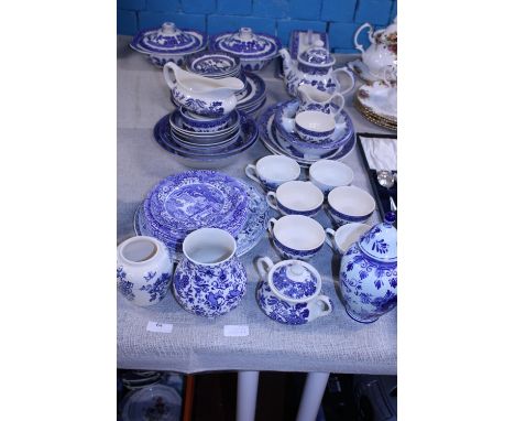 A large selection of vintage blue and white ceramics including Johnson Brothers, Churchill and Spode. Postage unavailable 