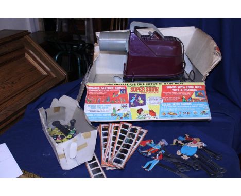 A vintage children's Chad Valley slide projector with slides 