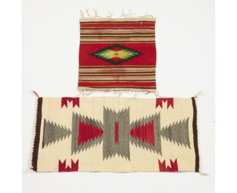 Group of two Dine (Navajo) Native American wool rug textiles, 20th century. Including:One Germantown yarn saddle blanket with