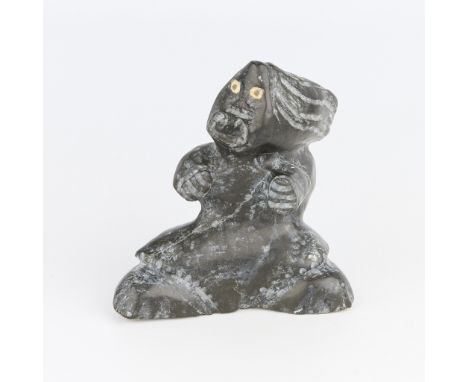 Kenneth Puqiqnak, Inuit (Uqsuqtuuq - Gjoa Haven, 20th c). Soapstone carving depicting a figure striking an assertive stance w