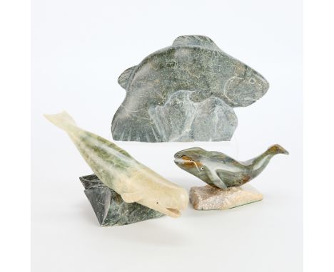 Group of two whale sculpture and one fish including:One large stone carving on a jumping fish with incised details. Signed wi