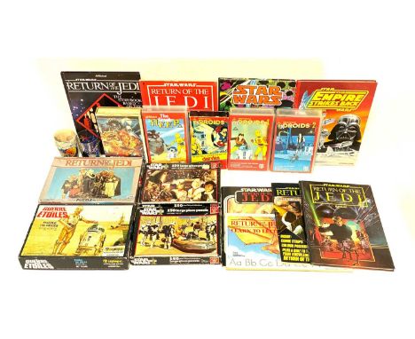 Selection of vintage Star Wars collectables including Jigsaws, Annuals, Magazine Story Books, Stationary, Dixie Cups, VHS Vid