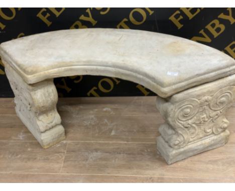 Curved Concrete garden bench with floral patterned supports