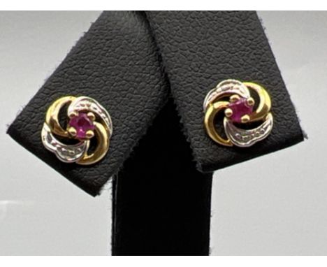 Ladies 9ct gold Ruby stud earrings.
