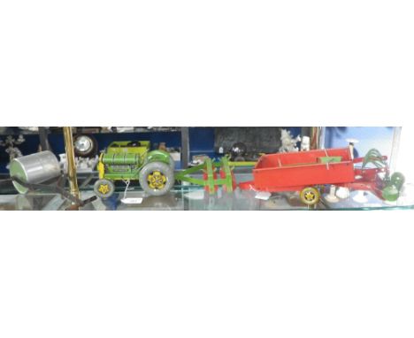 A Mettoy Playthings tin-plate tractor, trailer and accessories, along with a Knightshead tin garden roller