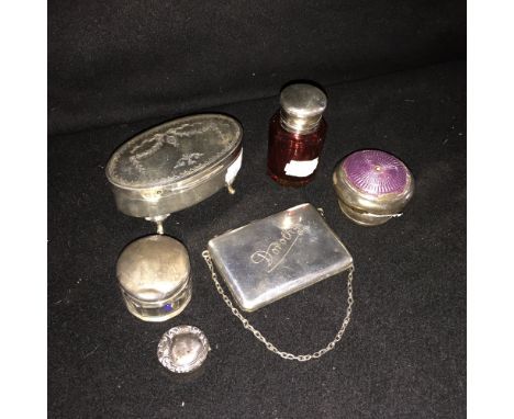 A silver lidded cranberry glass scent flask and other dressing table items