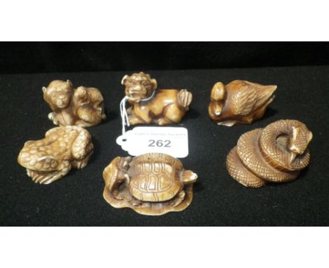 Six 'Netsuke' style ornaments of animals