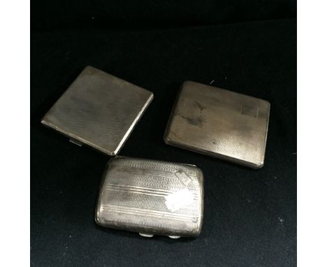 Three silver cigarette cases with various engine-turned decoration