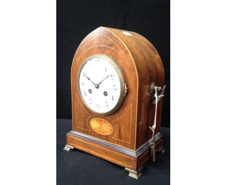 A 19th century rosewood and inlaid mantel clock, 12" high