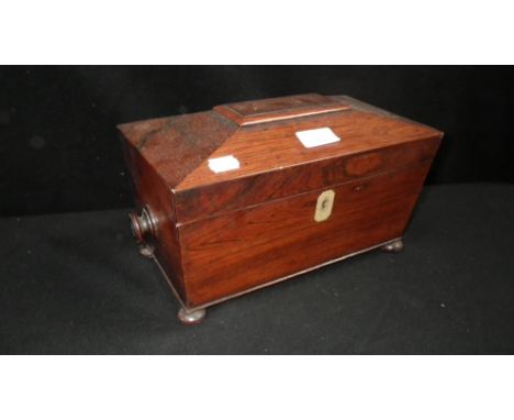 A 19th century rosewood sarcophagus tea caddy