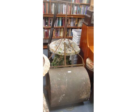 A Victorian cast-iron garden roller