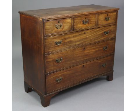 A late 18th century oak chest with reeded edge, fitted three short &amp; three long graduated drawers, &amp; on ogee bracket 
