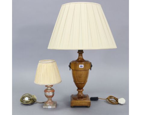 A treen table lamp with vase-turned centre column, &amp; on a square plinth, 30½” high; a composition table lamp base, 9½” hi