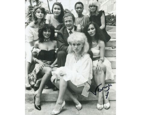 007 James Bond movie girls group 8x10 photo signed by topless model Vanya Seager. Good condition. All autographs come with a 