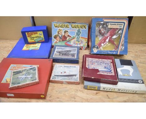 A collection of vintage boxed board gamesTo include "The Amazing Magic Robot", "Merritt Chemistry Outfit", "Thimble Drome Sup