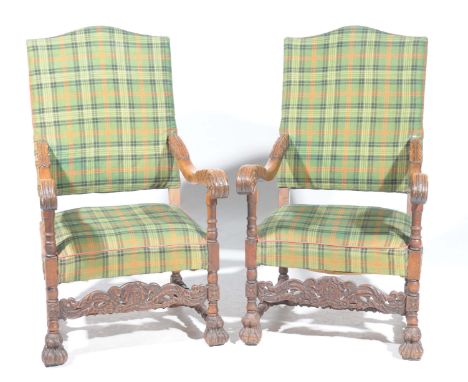 A pair of 17th Century style stained Beechwood and upholstered arm chairs, early 20th CenturyEach with arched padded backs co