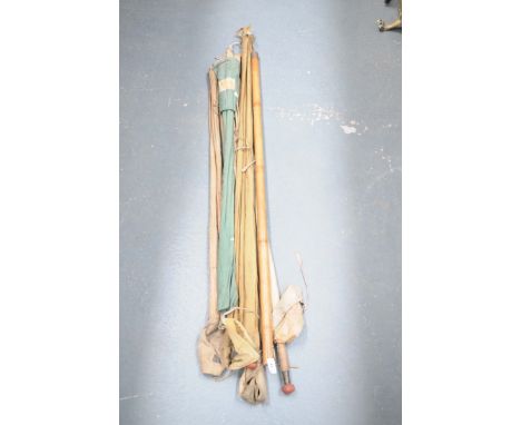Five vintage split cane fishing rodsIncluding a four piece example in a canvas holdall, a 9ft example, Colt Craft along with 