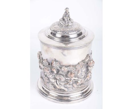A silver plated biscuit barrelOf cylindrical form, with beaded borders and applied putti decoration, the finial modelled as a
