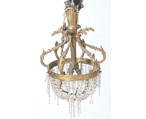 A late 19th early 20th Century gilt metal and droplet pendant light fittingWith a central spirally incised shaft embraced by 