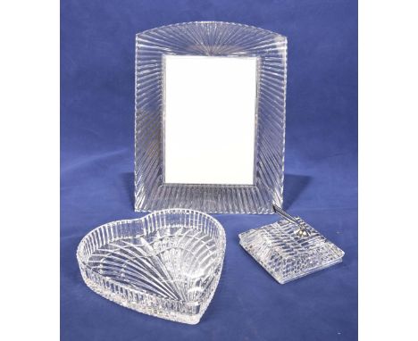 Three Waterford cut glass itemsTo include a cut glass easel photograph frame, a heart shaped trinket dish and a cut glass pen