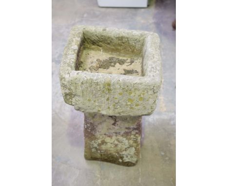 A sandstone trough and a sandstone pillarThe square trough along with a rectangular sandstone pillar, height of pillar 50cm, 