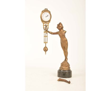Late 19th early 20th Century gilt Spelter figural timepiece Modelled as a classical female nude upon a circular plinth base s