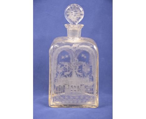 A 19th Century decanter
With a button shaped stopper, etched with a scrolling foliate design and stylised landscape, 23cm hig