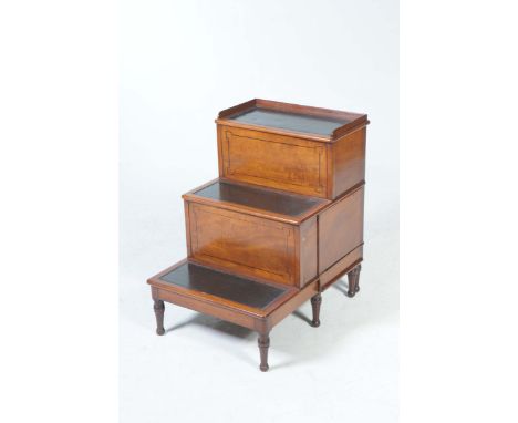A 19th Century mahogany set of library stepsThe galleried and leather inset hinged top step concealing a vacant interior abov