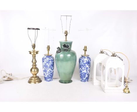 Six assorted table lamps and lanternsTo include a pair of early 20th Century Losol Ware blue and white leaf pattern tapering 