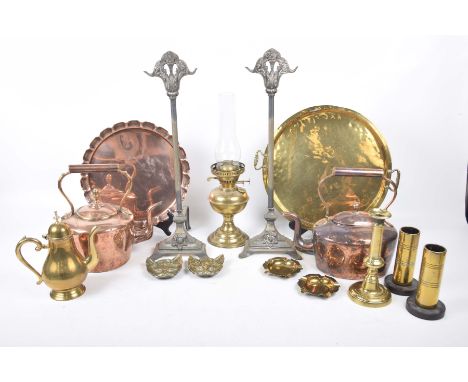 A collection of brass and copper wareTo include two Victorian copper kettles with oval head loop handles, various brass ashtr