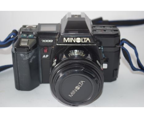 Minolta 7000 AF together with Sigma Zoom lens, bag and manual