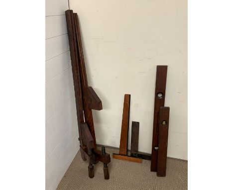 A selection of vintage sprit levels and set squares, carpenters tools 