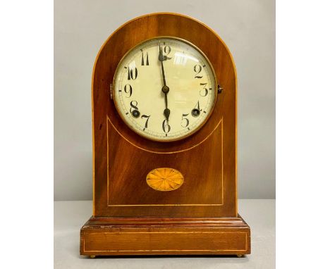 A Domed mahogany, with fruitwood inlay eight day mantle clock.