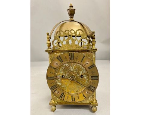 A brass lantern clock possibly 17th century AF (H38cm)