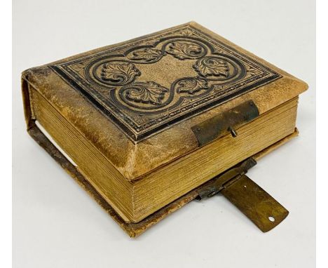 A leather bound album of vintage photographs 