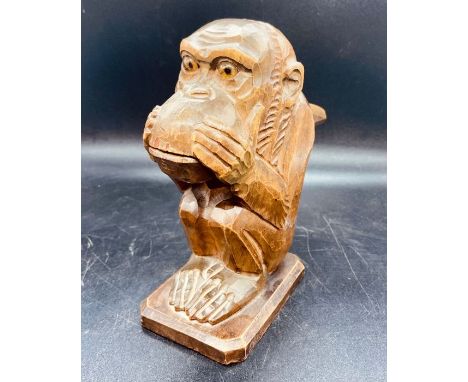 An Antique carved nut cracker in the style of a Monkey.