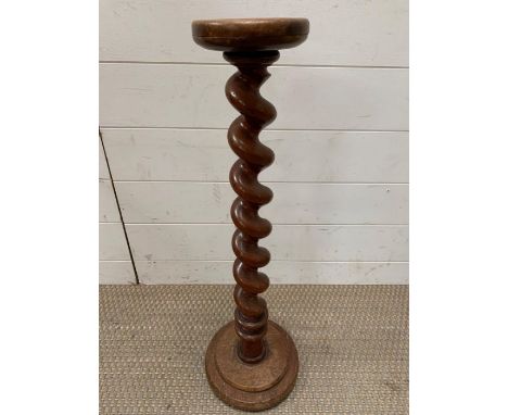 A mahogany spiral turn candle stick stand (H70cm)