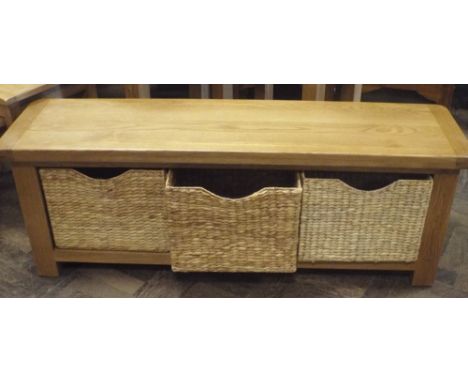 A new heavy light oak 2 tier bench fitted 3 pull out wicker drawers 4'3 long 