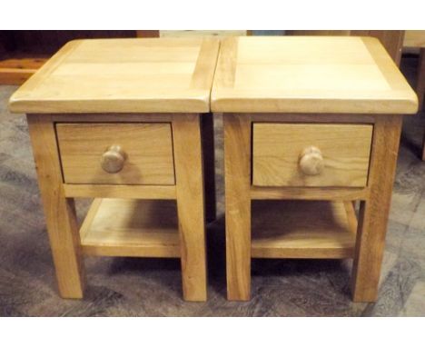 A pair of 2 tier new heavy light oak square lamp tables each fitted 1 drawer