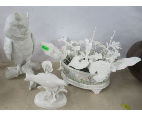 A Royal Crown Staffordshire white bird model, together with a white Kaiser eagle owl model and a white flower ornament