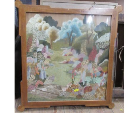 A framed tapestry picture