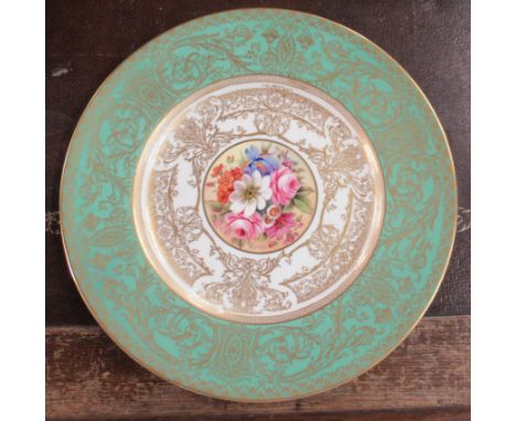 &nbsp;A Royal Worcester plate, the centre decorated with flowers by Freeman, diameter 10.5ins