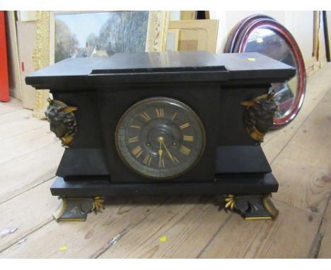 A large 19th century black slate mantel clock&nbsp;