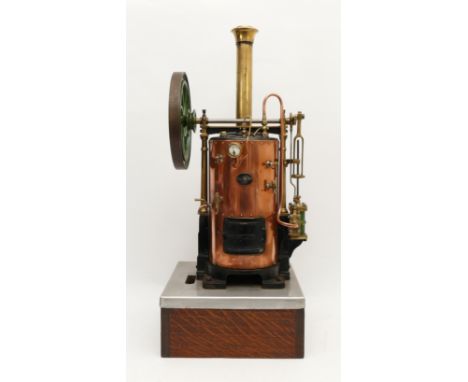 A scratch built exhibition standard live steam mill engine, the single cylinder with mounted spoked flywheel supplied with st
