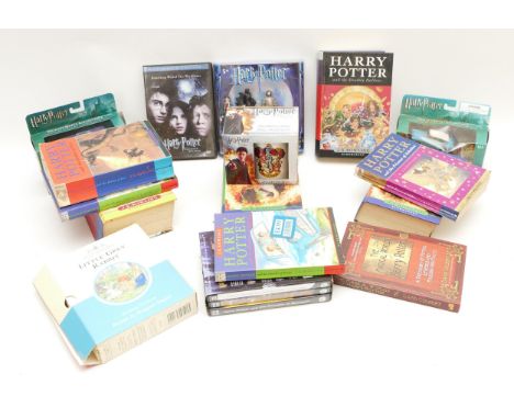 An assortment of Harry Potter related merchandise, to include First Edition copies of Harry Potter and the Order of the Phoen