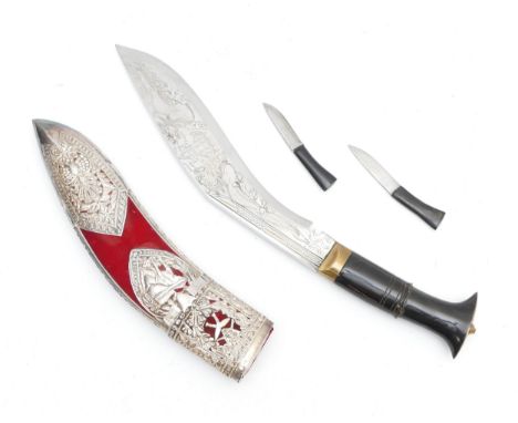 A 20th century dress kukri, detailed with the Chinese dragon along the blade, 27cm with scabbard.