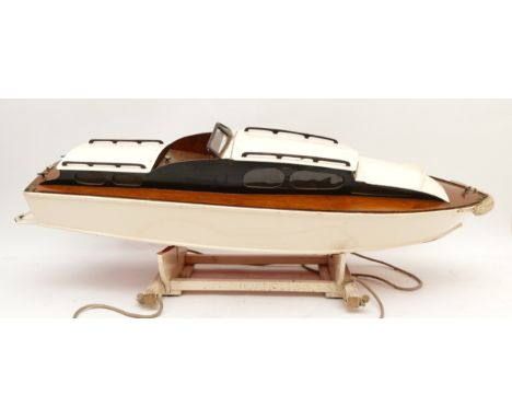 A scratch built radio controlled model motor boat, wooden construction, with removable super structure to reveal RC component