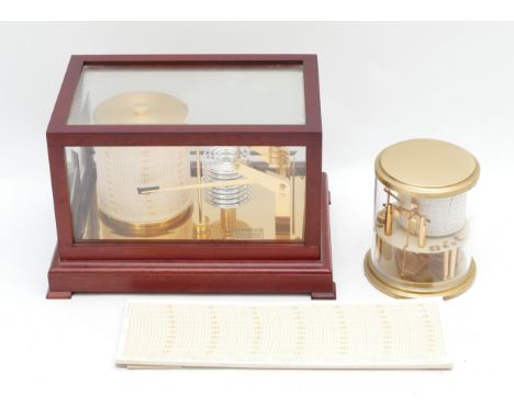 A mid-twentieth century barograph, housed in a bevelled glass, mahogany framed display case, together with a desktop barograp