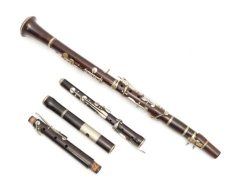 A late 19th century Chappell & Co Ltd rosewood clarinet, having four section body, nickel plated mounts and valves 60cm long,